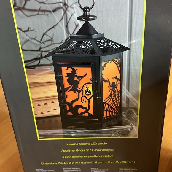 Halloween Lantern - 7.1”Lx7.1”Wx15.2”H. Includes LED candle with auto timer. - Picture 8 of 9